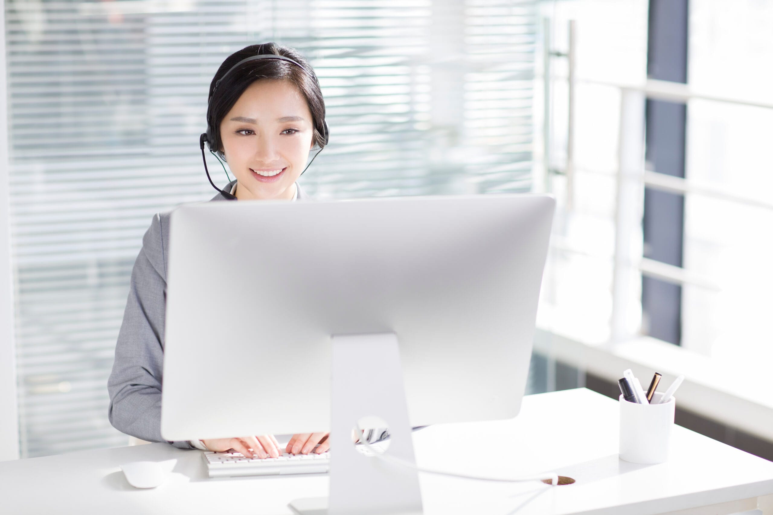 businesswoman working in office with headset 2023 11 27 05 35 51 utc businesswoman working in office with headset 2023 11 27 05 35 51 utc